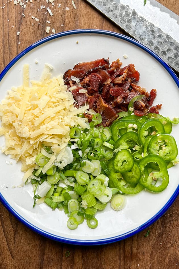 Potato Soup Toppings with shredded cheese, bacon, jalapeño and green onion